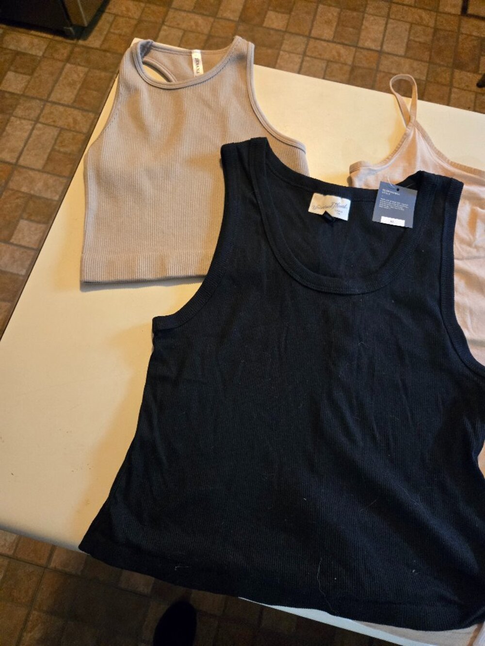4 pack bundle of new tank tops, none have been worn, L & XL